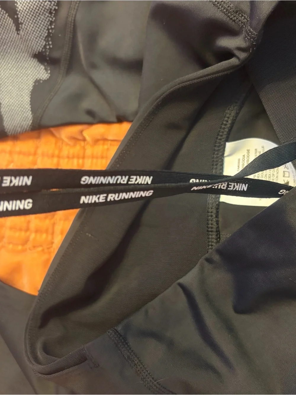 Nike Black Leggings with Silver Reflective Graphic Accents